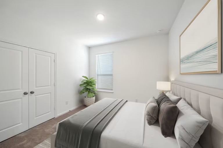 25478 Multiflora Drive Magnolia, TX 77355 - Photo 7 of 10 a bedroom with a bed and a window