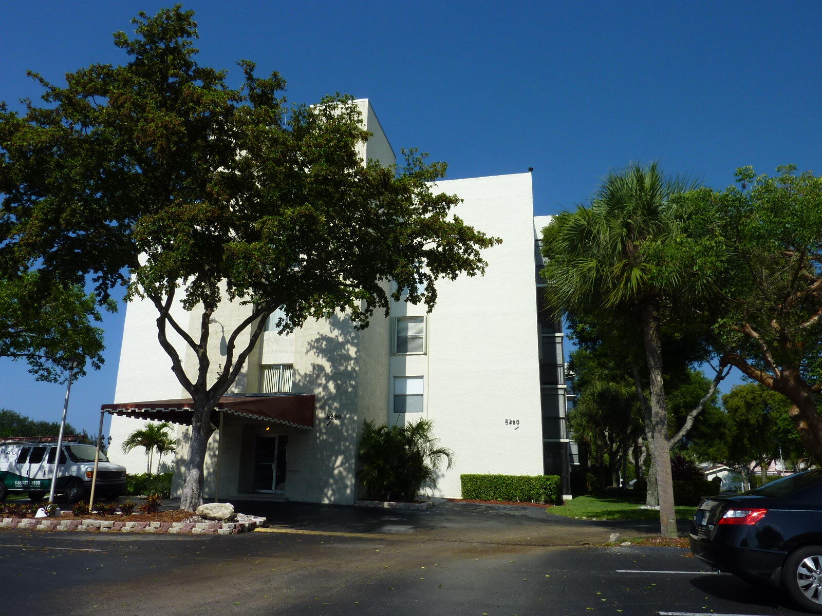 5280 Northwest 2nd Avenue, Unit 213 Boca Raton, FL 33487 - Photo 16 of 17 front view of a house with a street