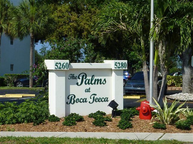 5280 Northwest 2nd Avenue, Unit 213 Boca Raton, FL 33487 - Photo 17 of 17 a sign on the side of a road