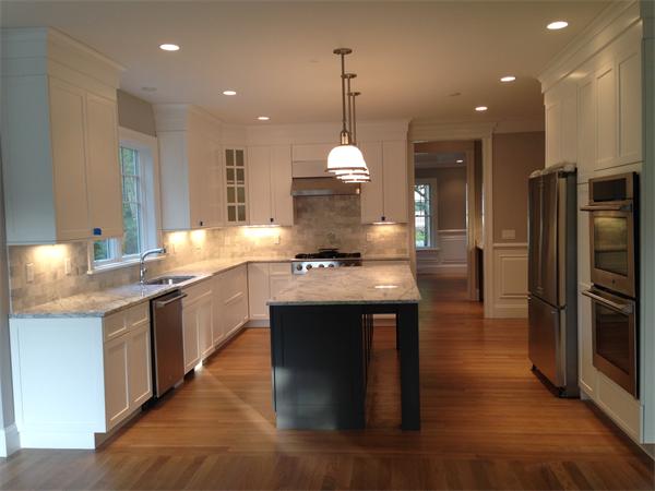 12 Willow Road Wellesley, MA 02482 - Photo 11 of 30 a kitchen with stainless steel appliances granite countertop a sink a stove and a refrigerator