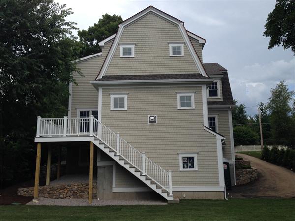 12 Willow Road Wellesley, MA 02482 - Photo 6 of 30 a front view of a house with a yard