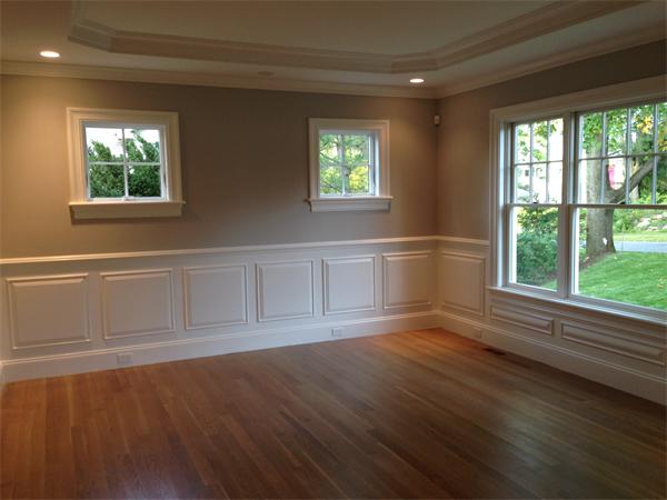 12 Willow Road Wellesley, MA 02482 - Photo 8 of 30 a view of an empty room with wooden floor and a window