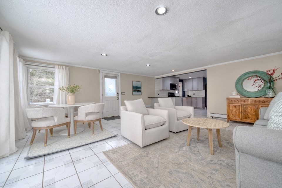 193 Vincent Road Dedham, MA 02026 - Photo 19 of 42 a living room with furniture and a window
