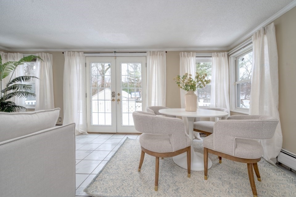193 Vincent Road Dedham, MA 02026 - Photo 21 of 42 a living room with furniture and a window