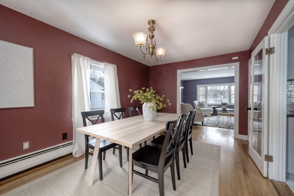 193 Vincent Road Dedham, MA 02026 - Photo 23 of 42 a view of a dining room with furniture window and wooden floor