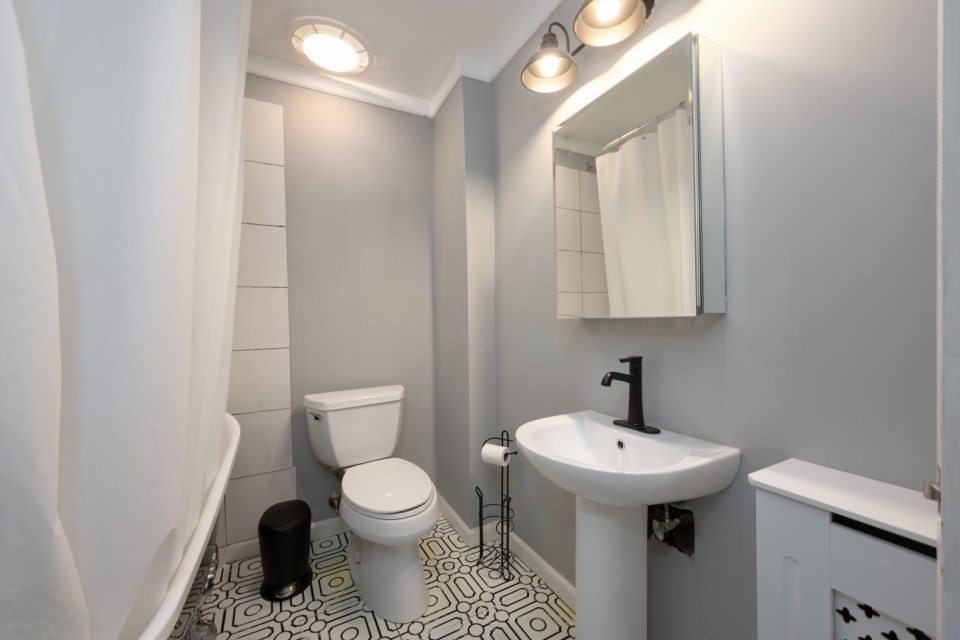 193 Vincent Road Dedham, MA 02026 - Photo 27 of 42 a bathroom with a sink toilet and mirror