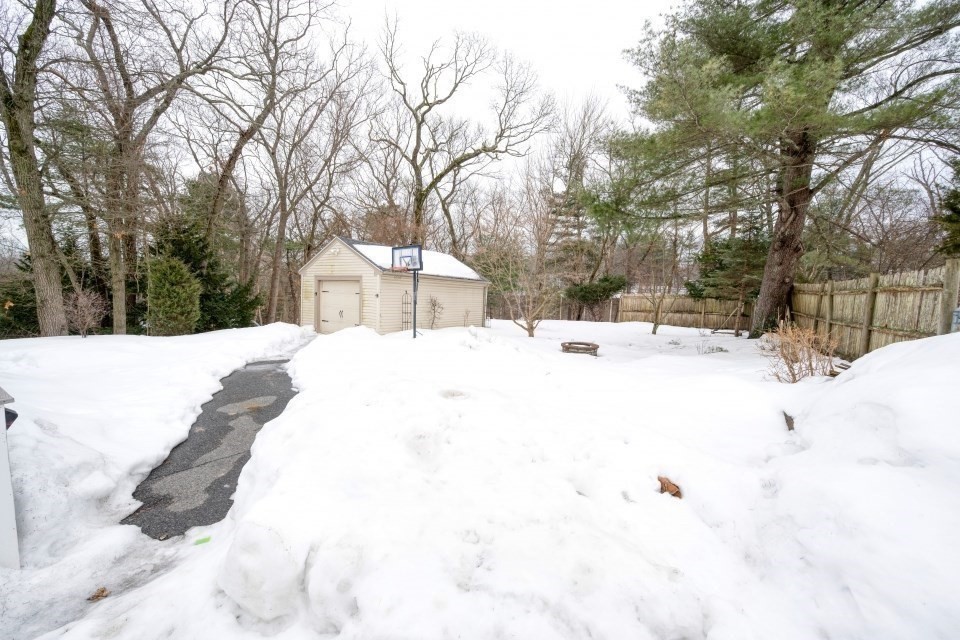 193 Vincent Road Dedham, MA 02026 - Photo 36 of 42 a view of a snow with a yard