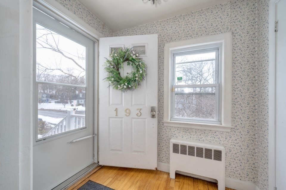 193 Vincent Road Dedham, MA 02026 - Photo 5 of 42 a view of a room that has a window in it