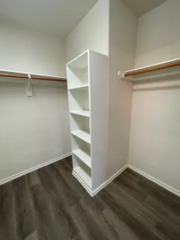 a view of an empty walk in closet