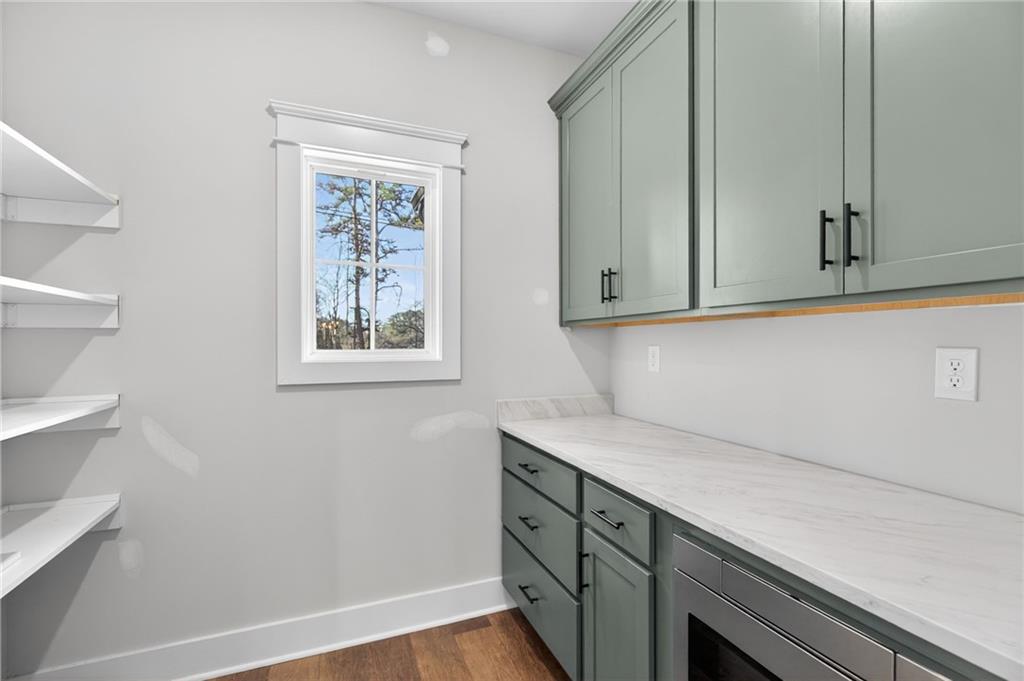 2203 Ridge Road Douglasville, GA 30134 - Photo 14 of 39 a view of cabinets with wooden floor