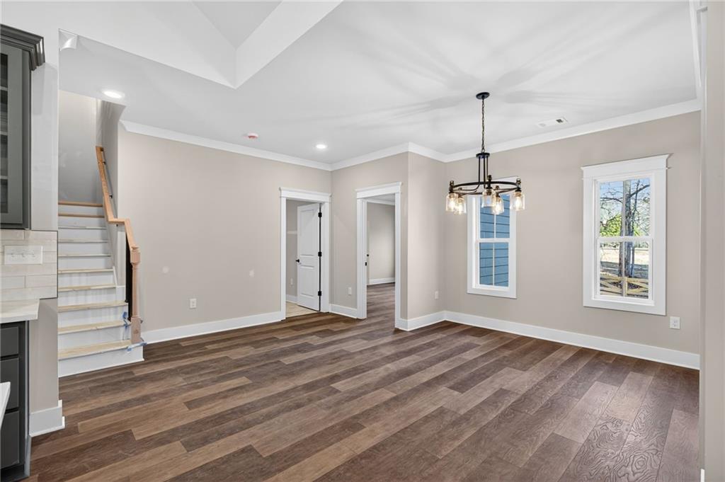 2203 Ridge Road Douglasville, GA 30134 - Photo 16 of 39 a view of an empty room with wooden floor and a window