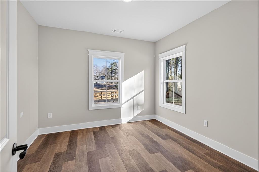 2203 Ridge Road Douglasville, GA 30134 - Photo 21 of 39 an empty room with windows