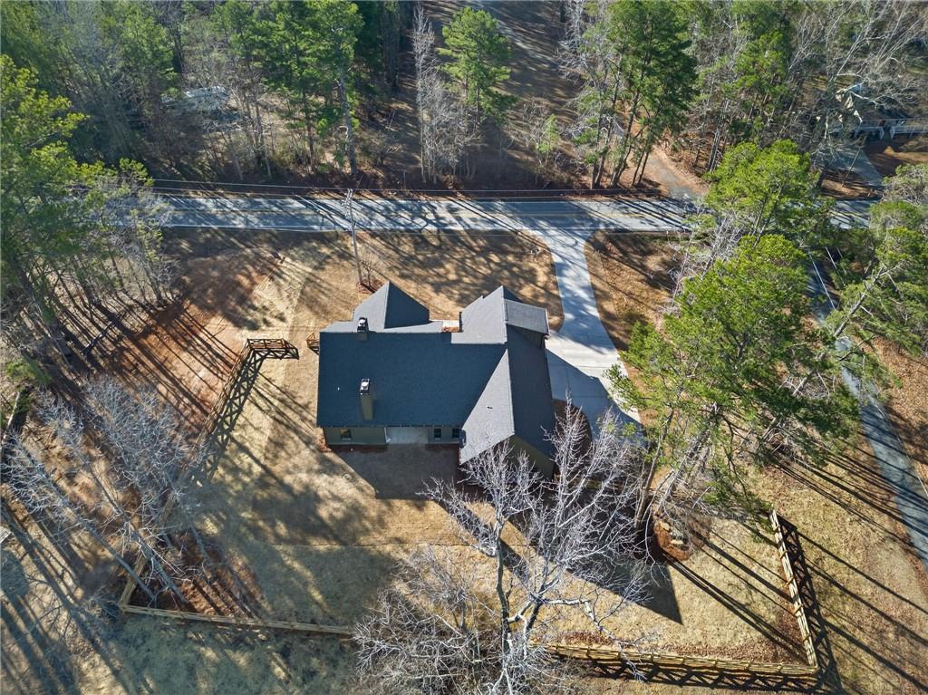 2203 Ridge Road Douglasville, GA 30134 - Photo 36 of 39 a backyard of a house with a yard and outdoor seating