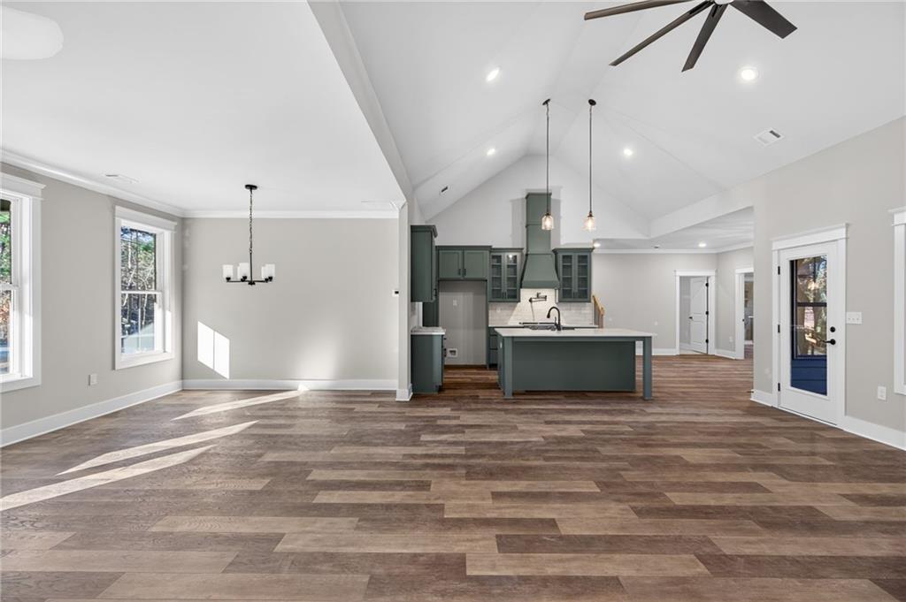 2203 Ridge Road Douglasville, GA 30134 - Photo 8 of 39 a kitchen with kitchen island a sink and a stove top oven