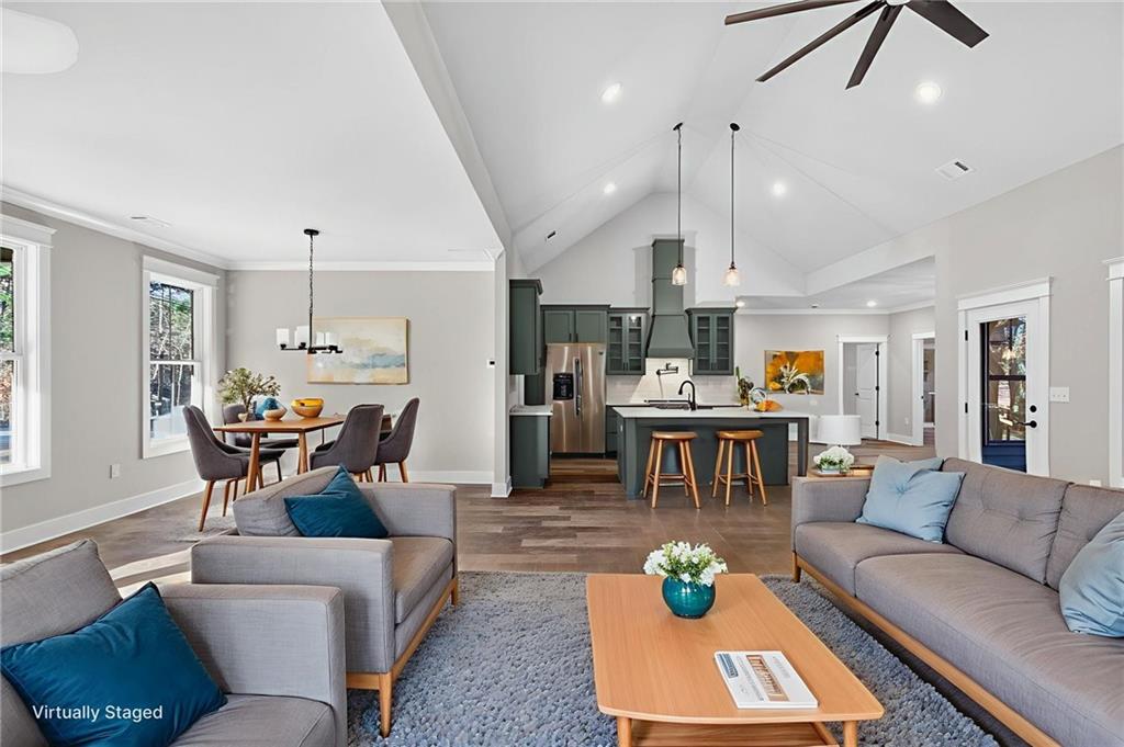 2203 Ridge Road Douglasville, GA 30134 - Photo 9 of 39 a living room with furniture and kitchen view
