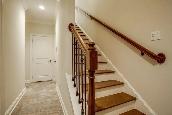 a view of entryway with wooden floor