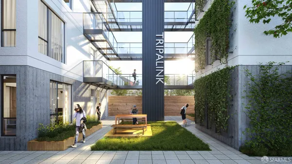 a view of a building with a yard