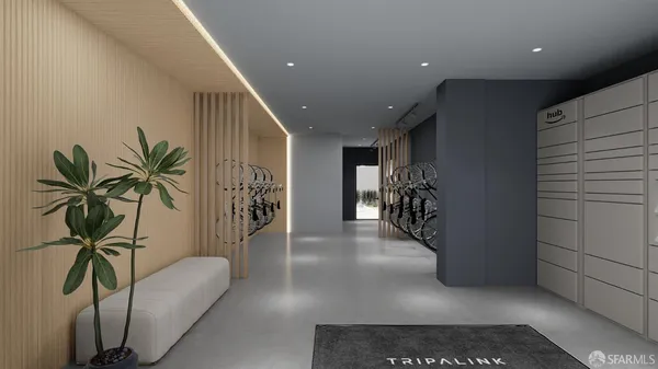 a hallway with a couch and a potted plant