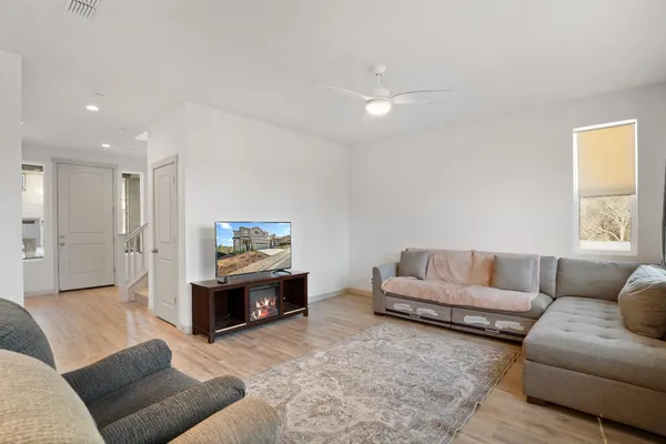 a living room with furniture and a couch