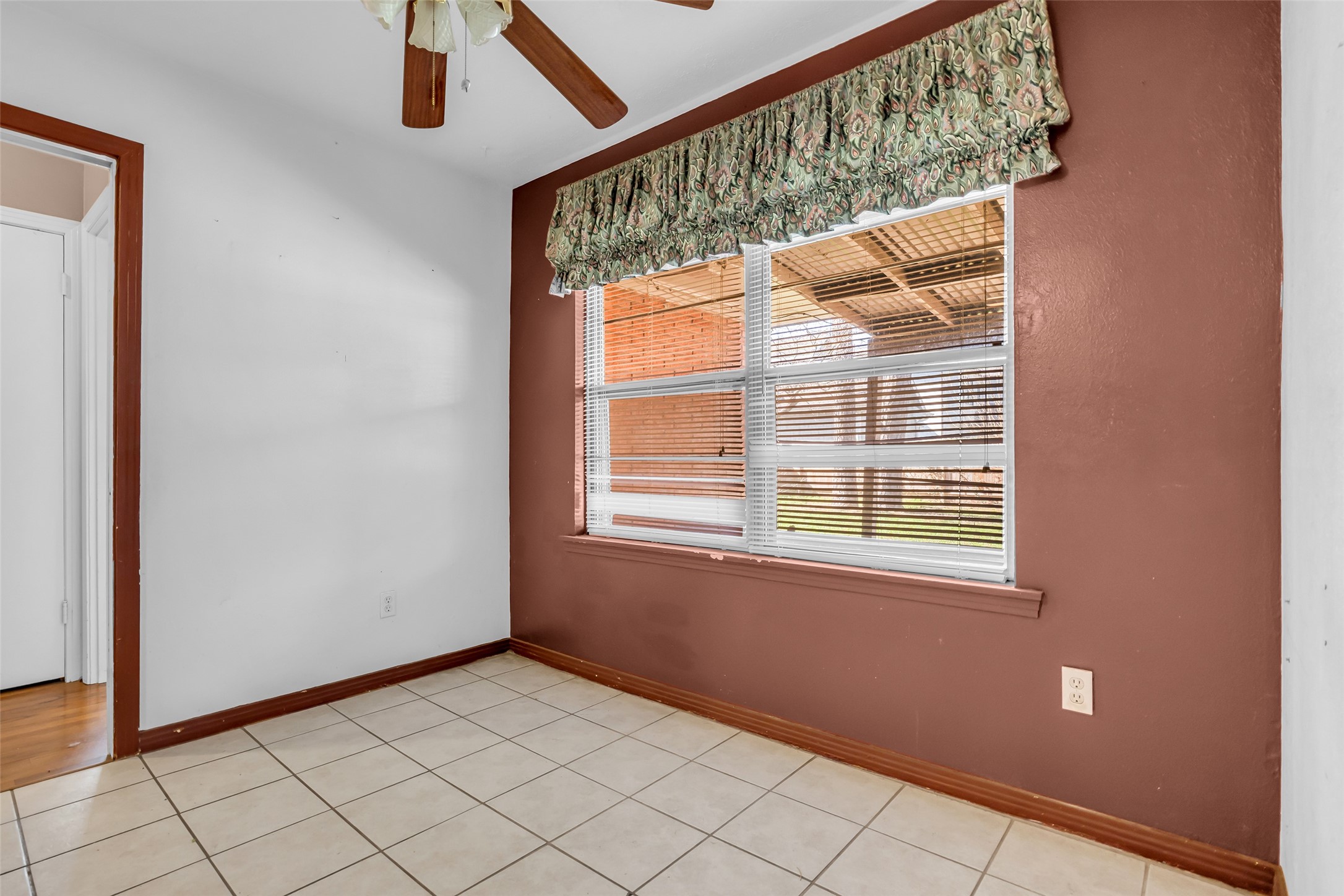 4825 Ella Boulevard Houston, TX 77018 - Photo 11 of 27 a view of an empty room with a window