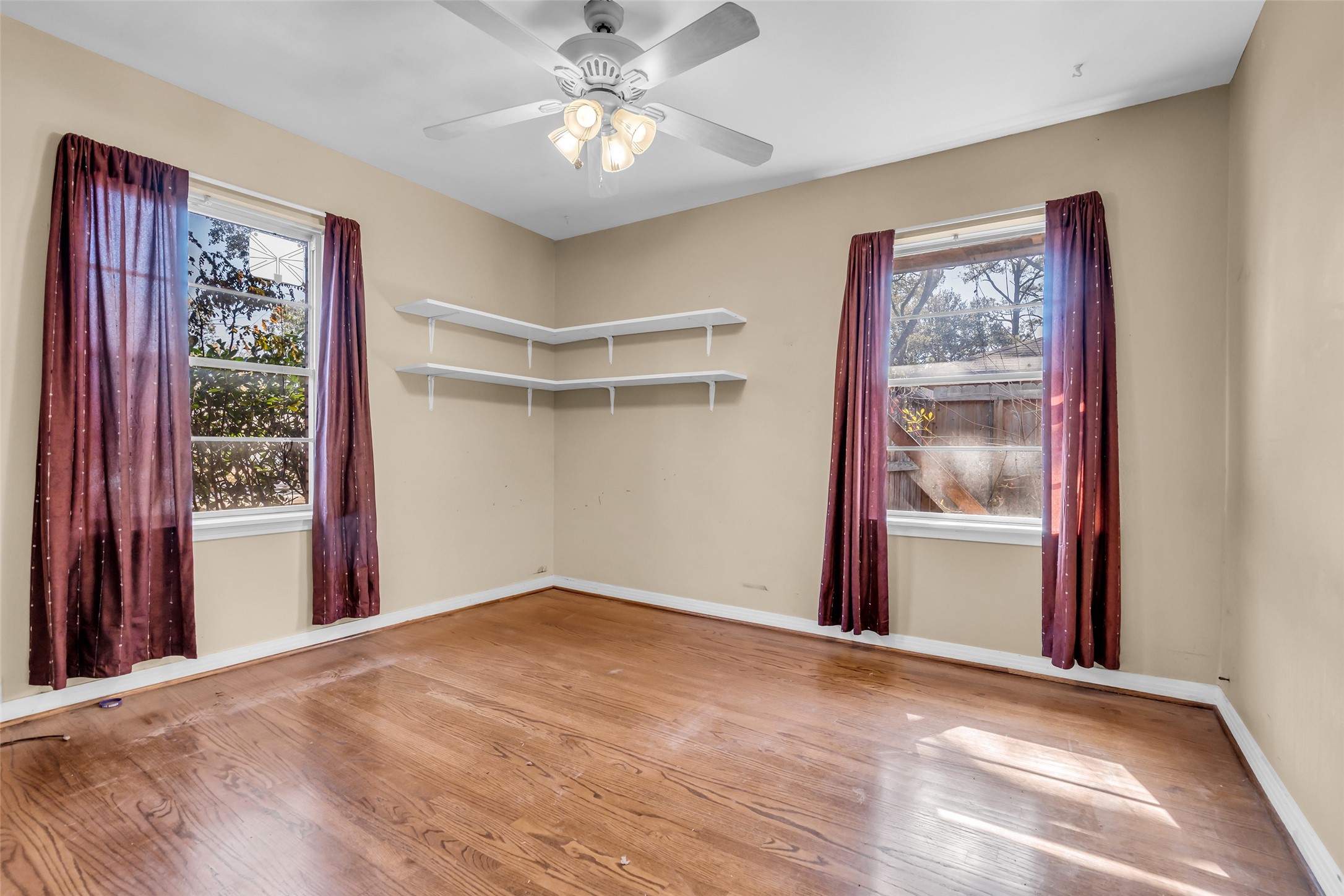4825 Ella Boulevard Houston, TX 77018 - Photo 15 of 27 a view of an empty room with a window