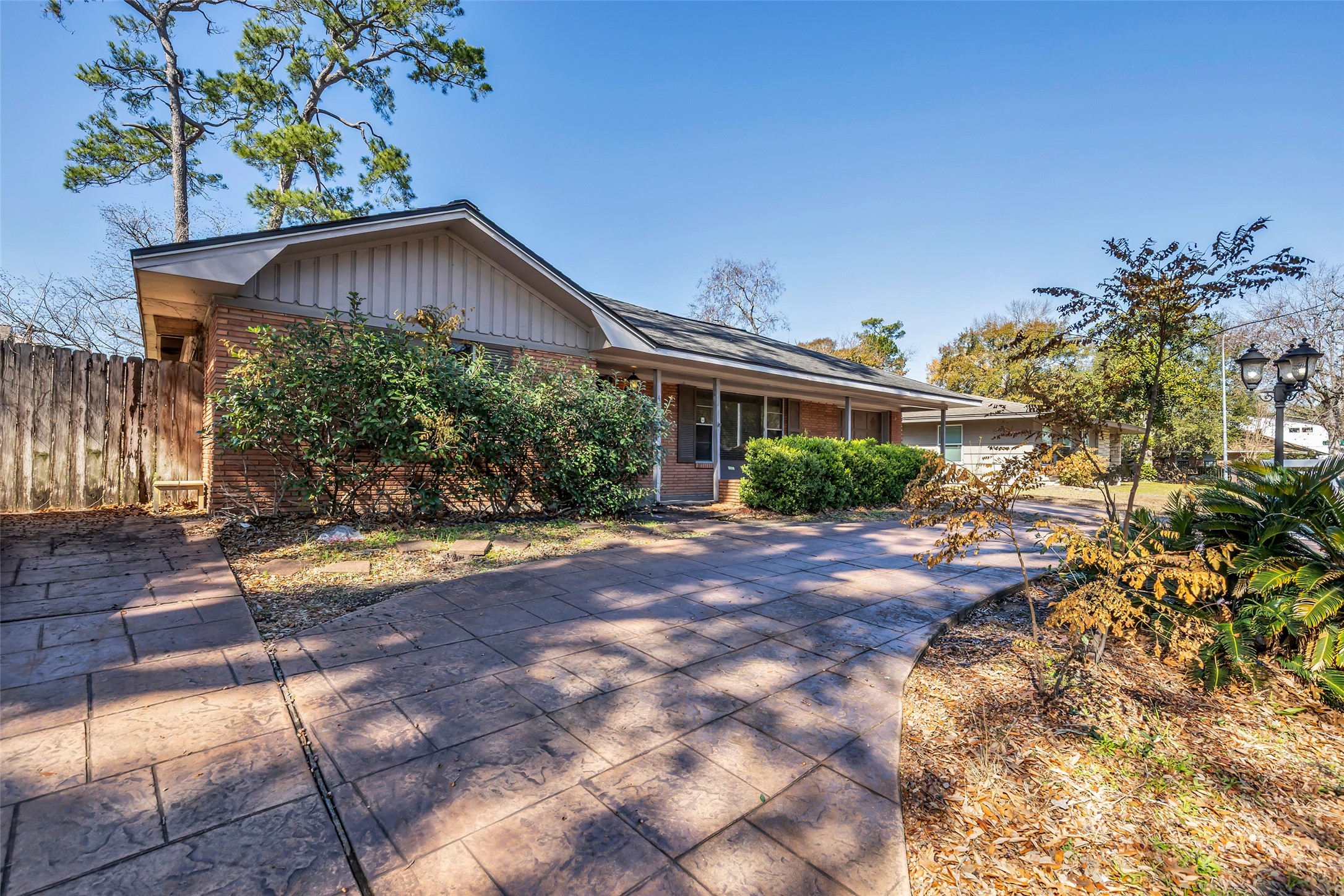 4825 Ella Boulevard Houston, TX 77018 - Photo 3 of 27 a view of a house with a yard