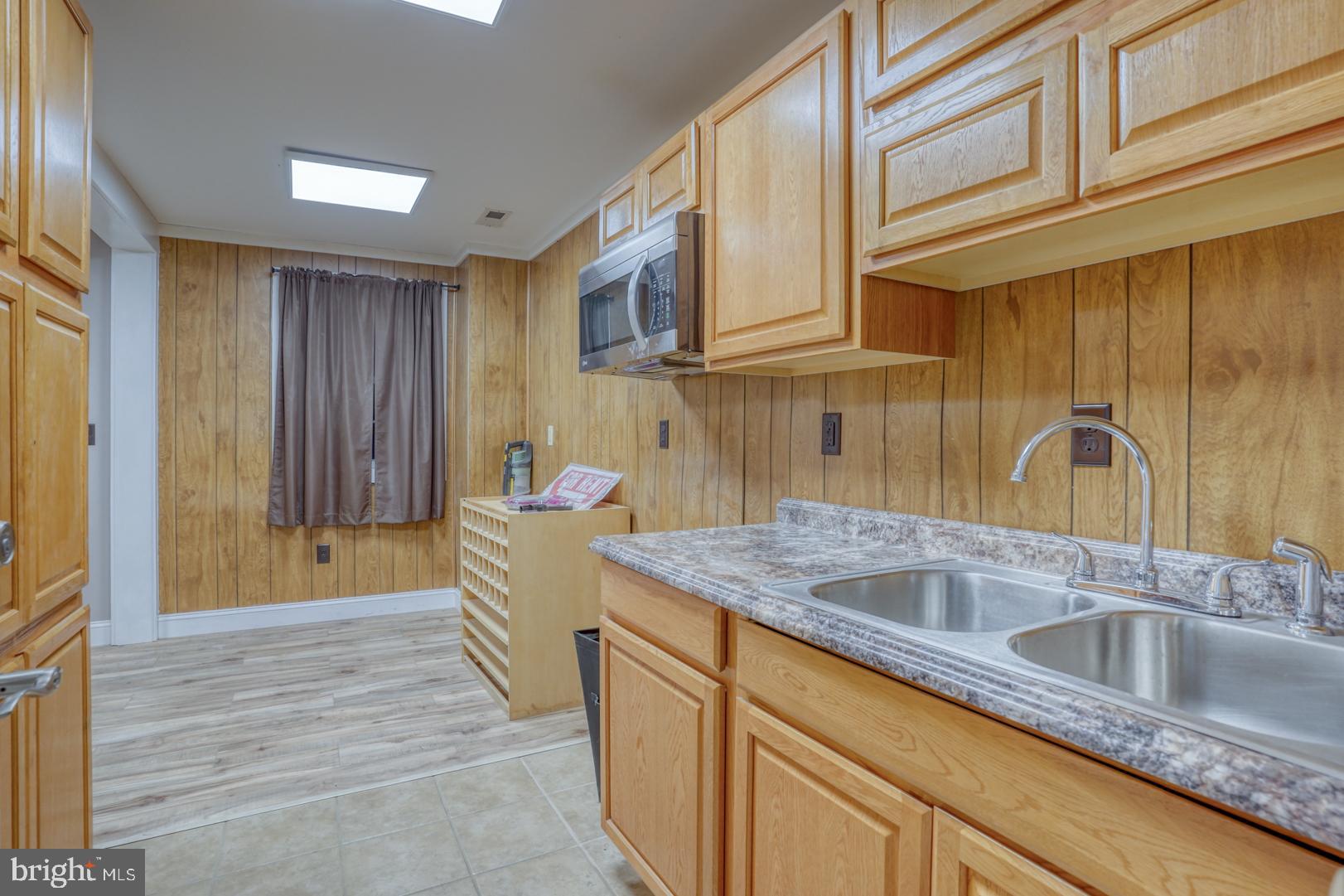 520 Mud Mill Road Marydel, DE 19964 - Photo 80 of 123 a kitchen with stainless steel appliances granite countertop a sink and cabinets