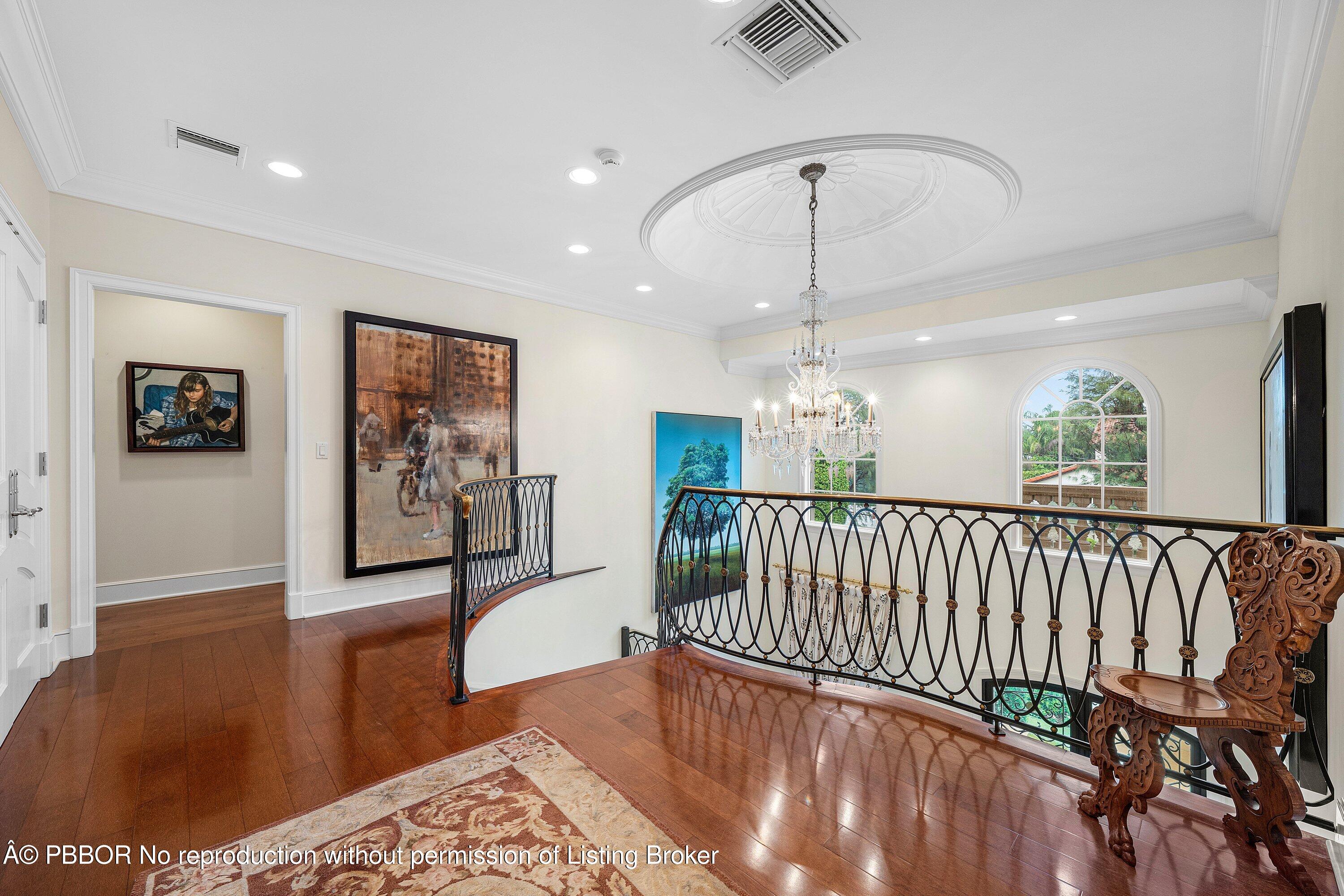 242 Wells Road Palm Beach, FL 33480 - Photo 19 of 54 a view of a hallway with furniture and lots of furniture