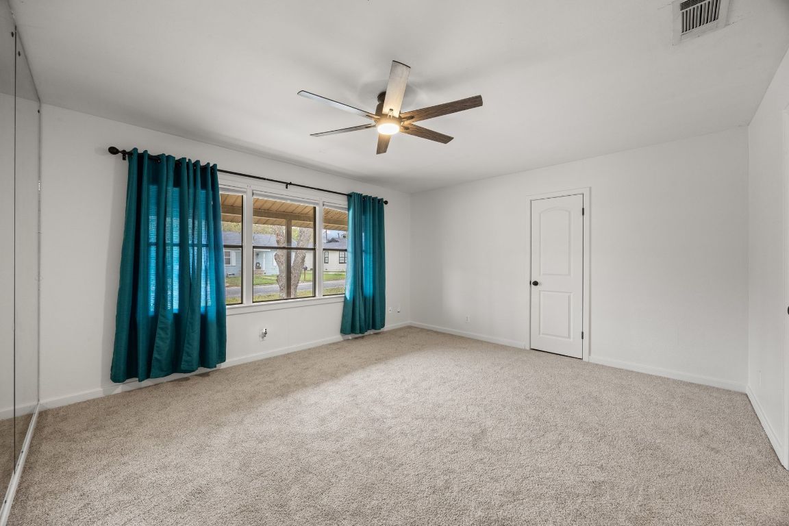 1815 Eckhardt Street Taylor, TX 76574 - Photo 11 of 33 a view of an empty room with a window