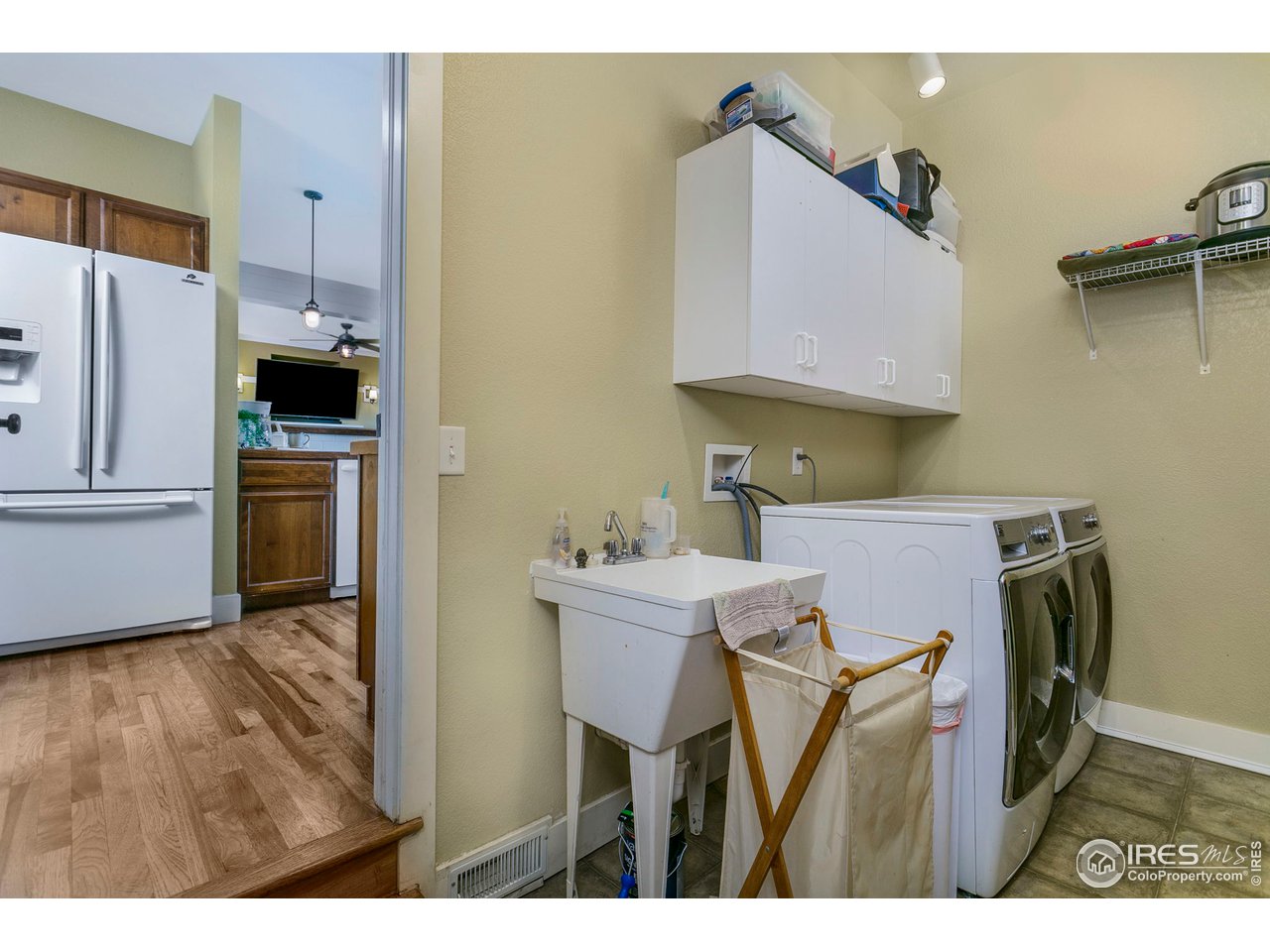 401 Timber Ridge Parkway Severance, CO 80550 - Photo 17 of 37 Laundry Room Features Sink and Storage