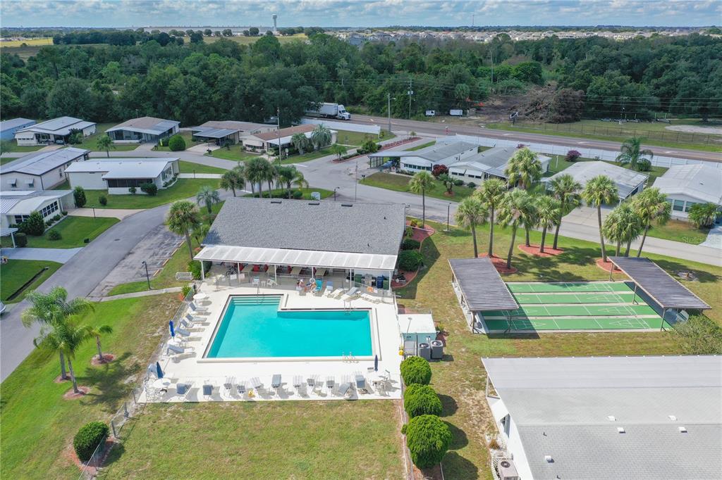 6518 Raintree Lane Winter Haven, FL 33881 - Photo 39 of 42 an aerial view of a house with a garden