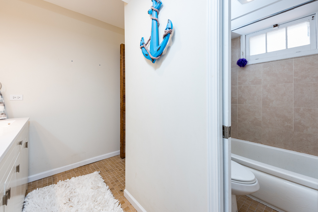 46 Tremont Road Fox Lake, IL 60020 - Photo 12 of 19 a bathroom with a bathtub and a shower