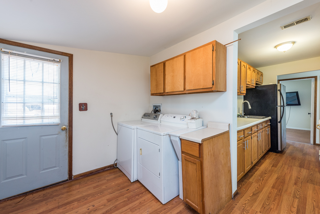 46 Tremont Road Fox Lake, IL 60020 - Photo 14 of 19 a utility room with wooden floor washer and dryer
