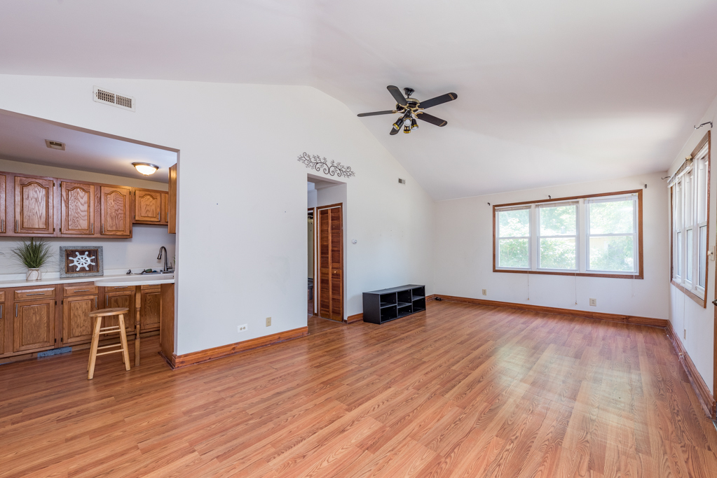 46 Tremont Road Fox Lake, IL 60020 - Photo 2 of 19 a view of workspace with wooden floor and windows