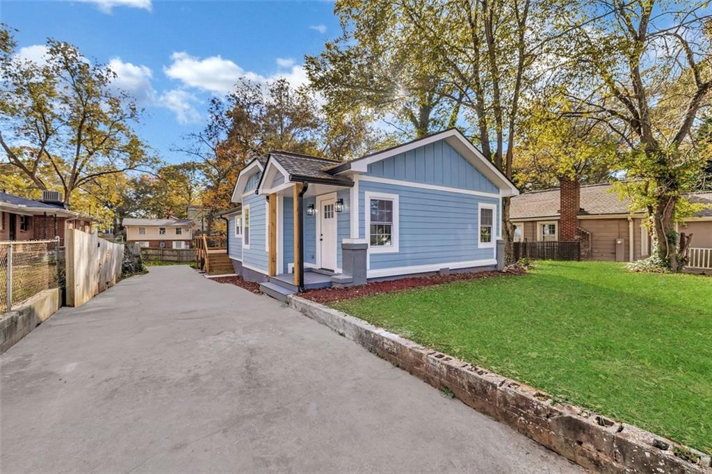 a house view with a garden space