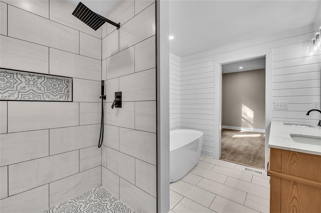 1874 Phillips Avenue East Point, GA 30344 - Photo 15 of 19 a bathroom with a shower and a sink