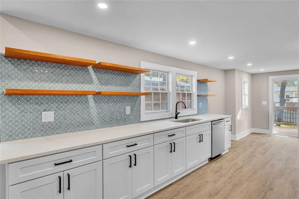 1874 Phillips Avenue East Point, GA 30344 - Photo 10 of 19 a kitchen with sink and cabinets