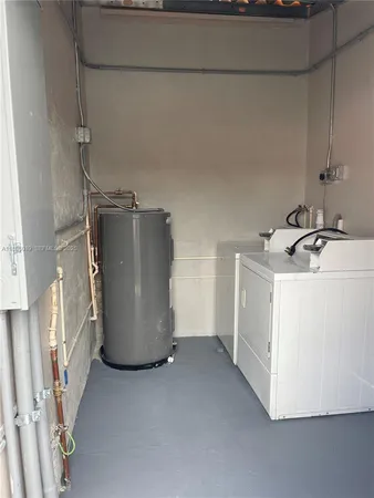 a room with a washer and dryer