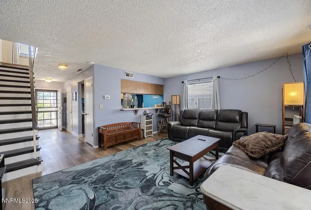 a living room with furniture and a couch
