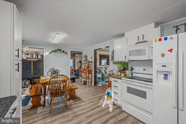 a room with furniture and a flat screen tv