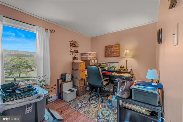 a bathroom with a sink toilet and mirror