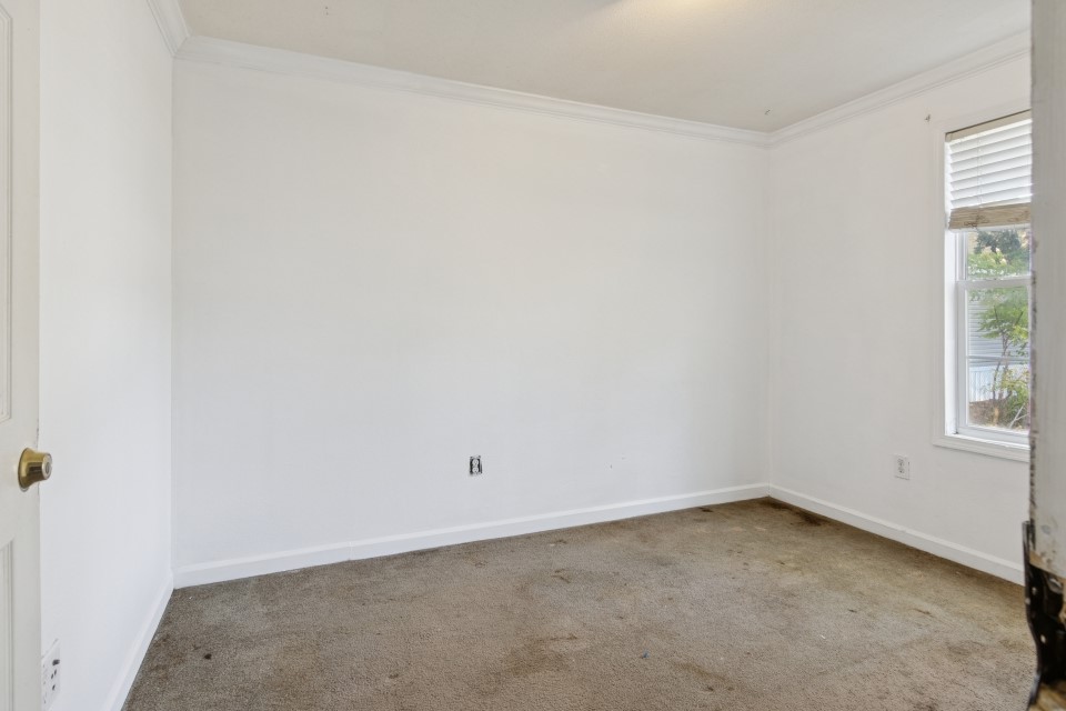 4619 2nd Street Bacliff, TX 77518 - Photo 20 of 24 an empty room with a window