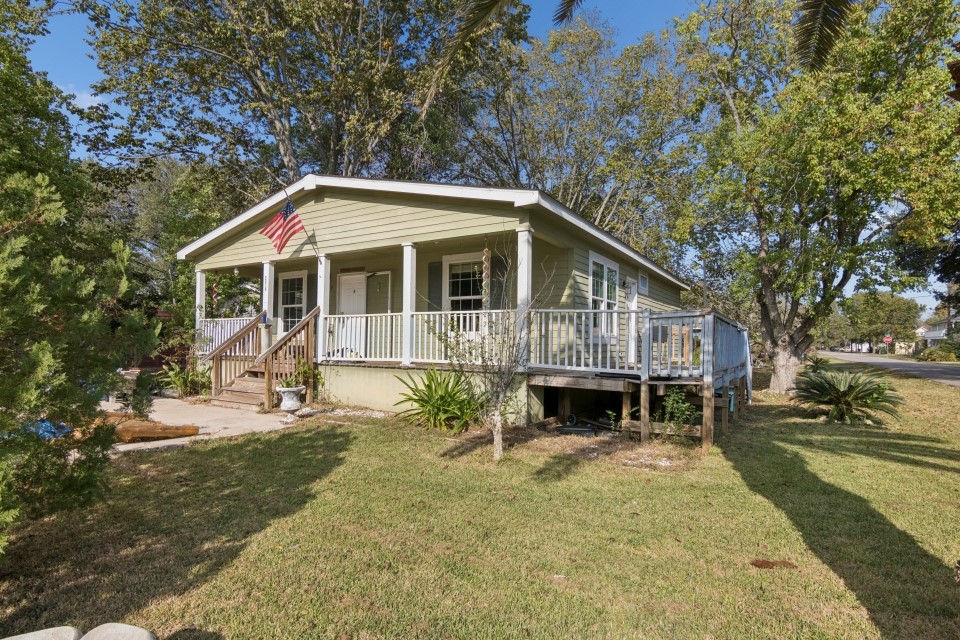 4619 2nd Street Bacliff, TX 77518 - Photo 2 of 24 a front view of a house with a yard outdoor seating and yard