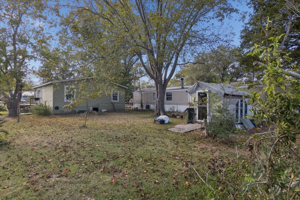 4619 2nd Street Bacliff, TX 77518 - Photo 21 of 24 a view of a house with a yard
