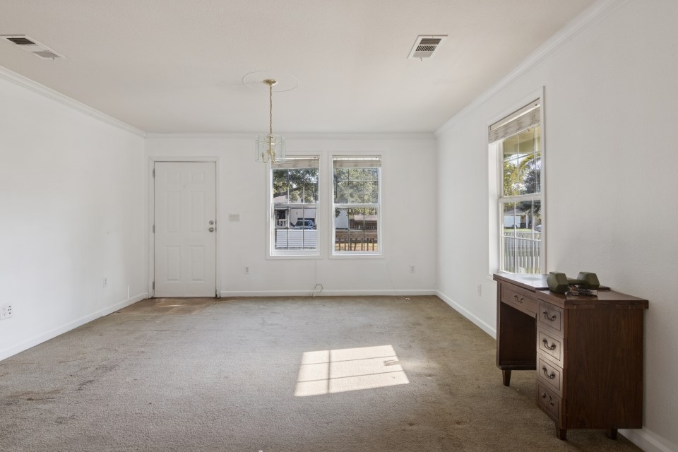 4619 2nd Street Bacliff, TX 77518 - Photo 6 of 24 a view of an empty room with a window