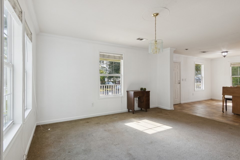 4619 2nd Street Bacliff, TX 77518 - Photo 8 of 24 a view of an empty room with a window
