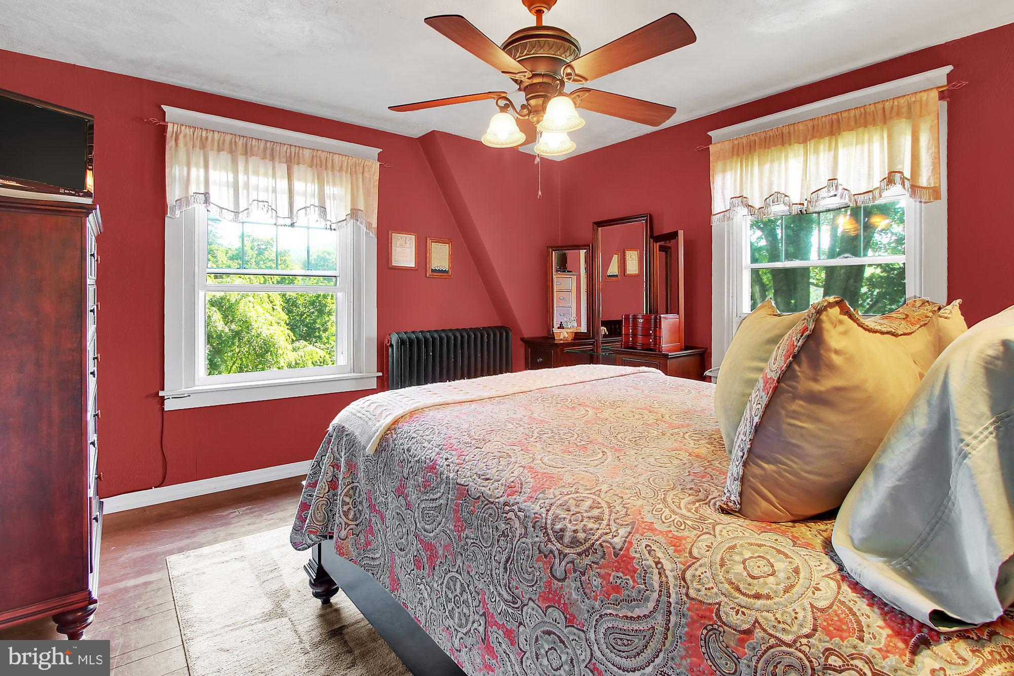 1704 Friedensburg Road Reading, PA 19606 - Photo 12 of 25 a bedroom with a large bed and a window