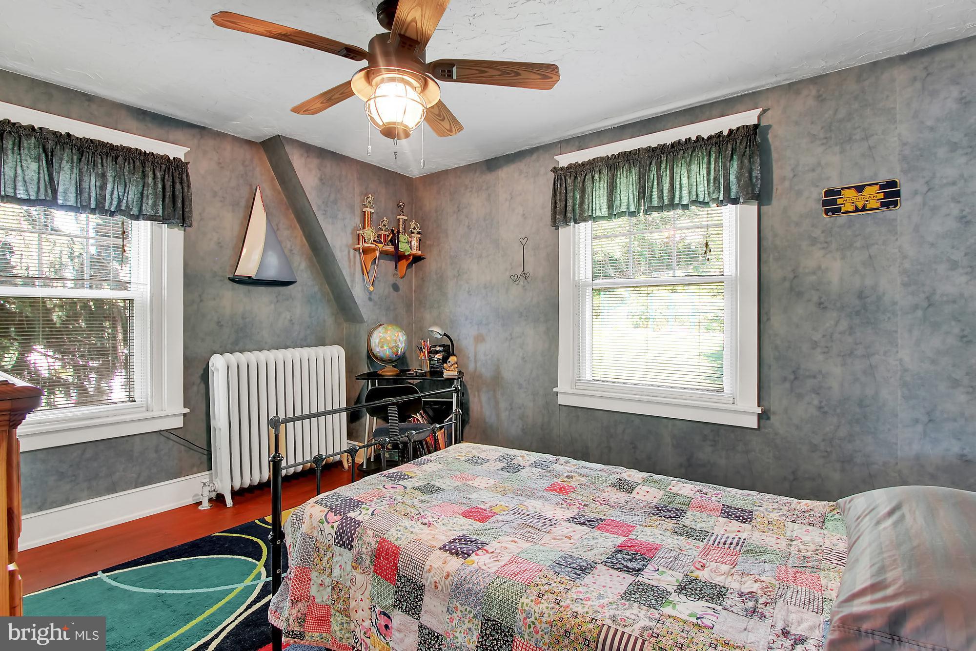 1704 Friedensburg Road Reading, PA 19606 - Photo 14 of 25 a bedroom that has a bed and a window