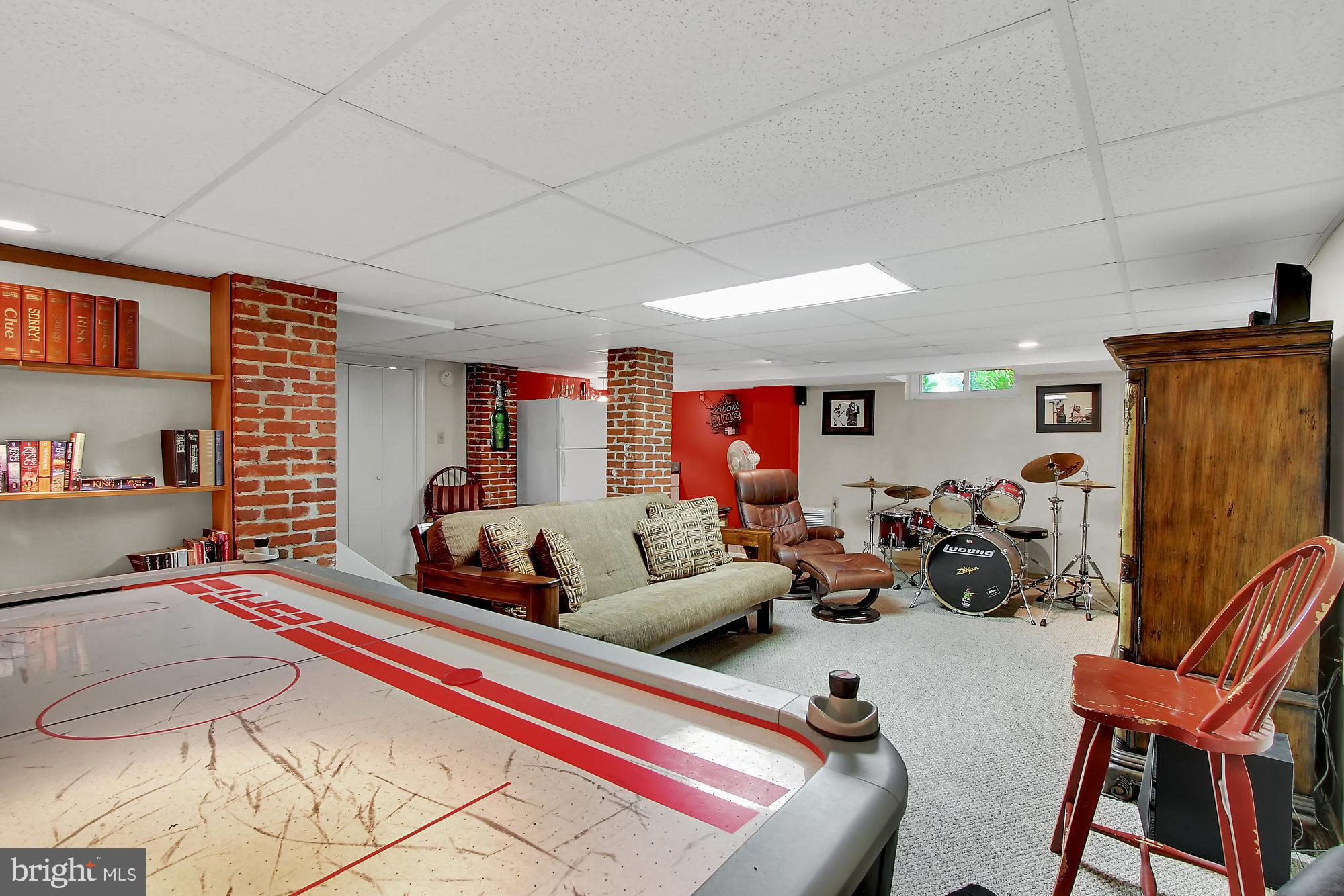 1704 Friedensburg Road Reading, PA 19606 - Photo 17 of 25 a living room with furniture a window and a flat screen tv