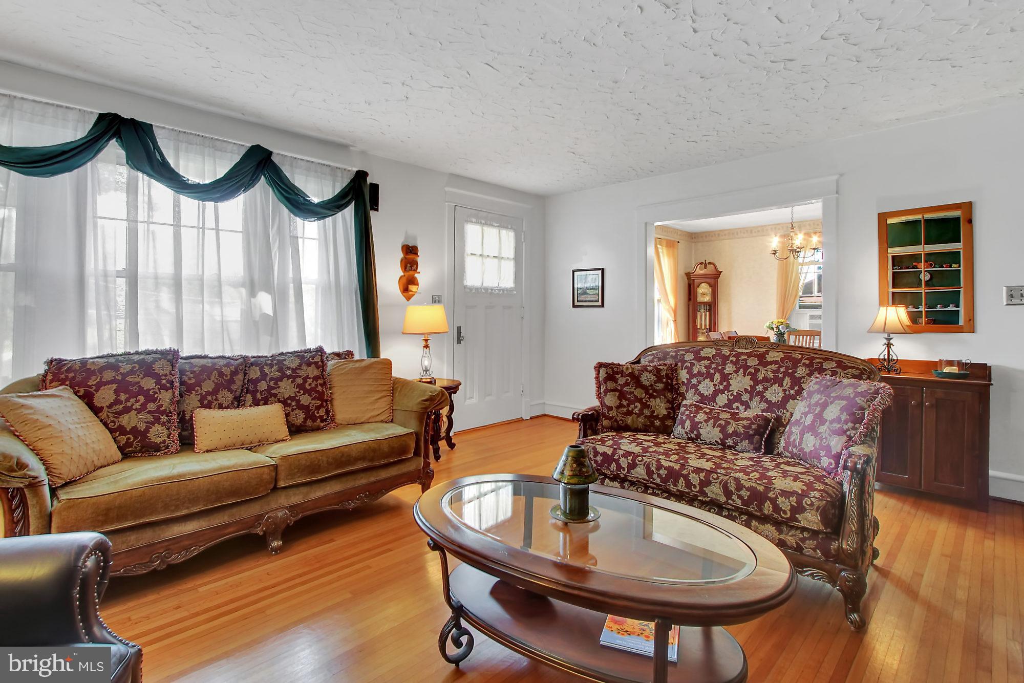 1704 Friedensburg Road Reading, PA 19606 - Photo 3 of 25 a living room with furniture and a wooden floor